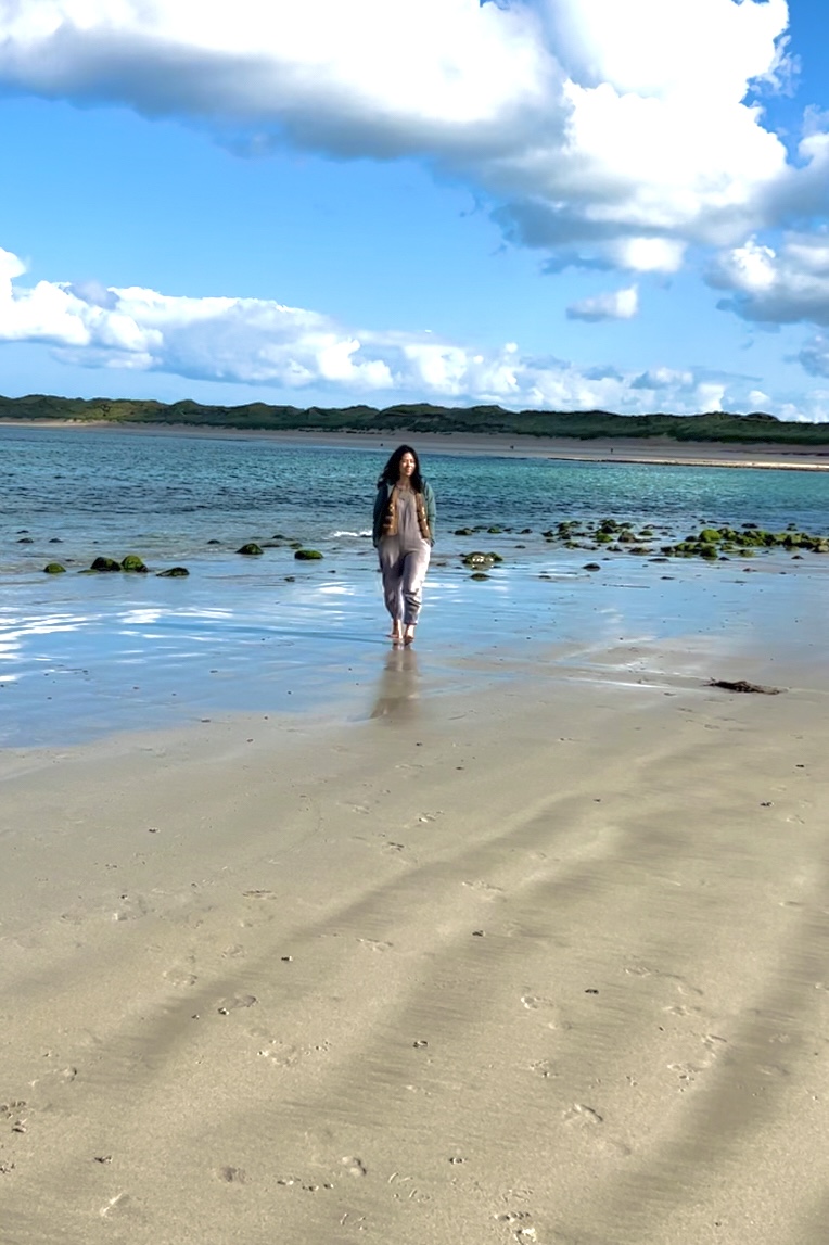 walking barefoot on the beach